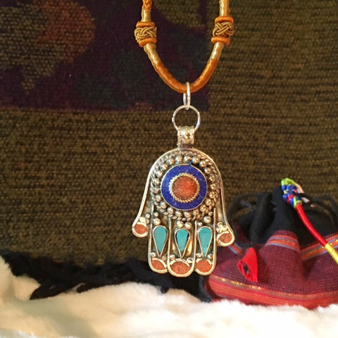 Tibet and Nepal hand shaped Buddha amulets