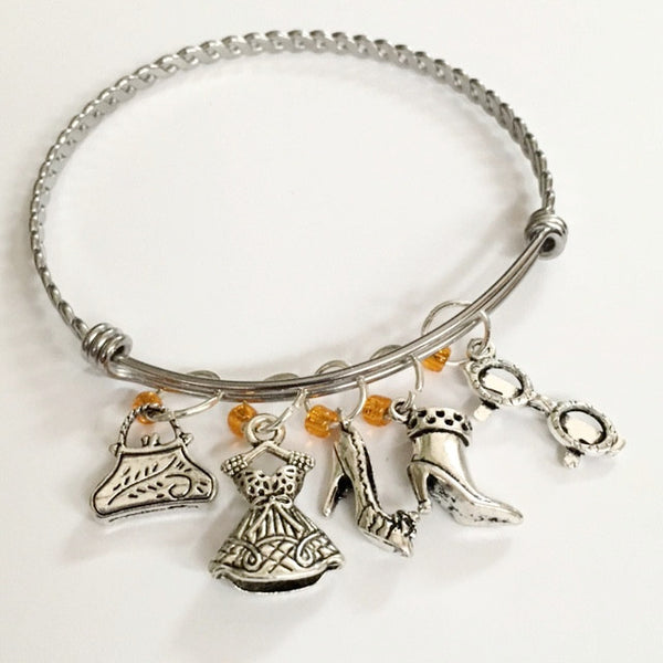 Charm bracelet; fashion girl theme/"Elsa Schiaparelli"