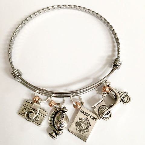 Charm bracelet; world traveler theme/Nellie Bly