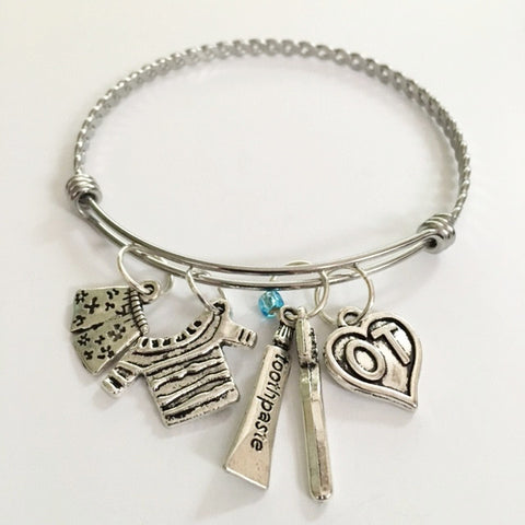 OT occupations charm bracelet; grooming, bathing and feeding "Olive"
