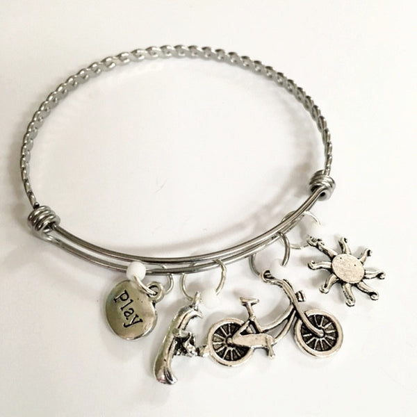 Charm bracelet; fun outdoors theme/ canoe and bike