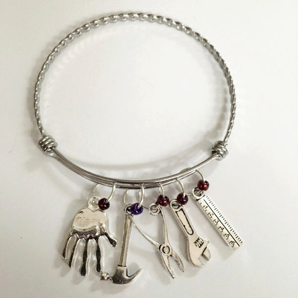 Charm bracelet; under construction theme/hand built