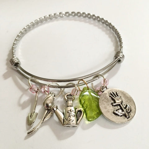Charm bracelet; Gardening joy/Gardening instruments
