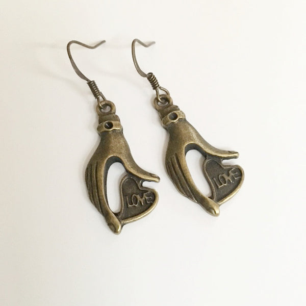 Earrings hand shaped/hand therapy jewelry/ Hands holding heart