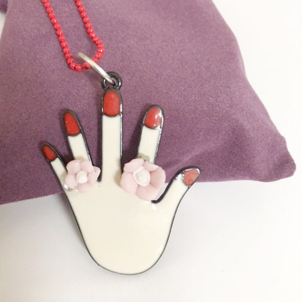 Decorative hand pendant/hand therapy jewelry