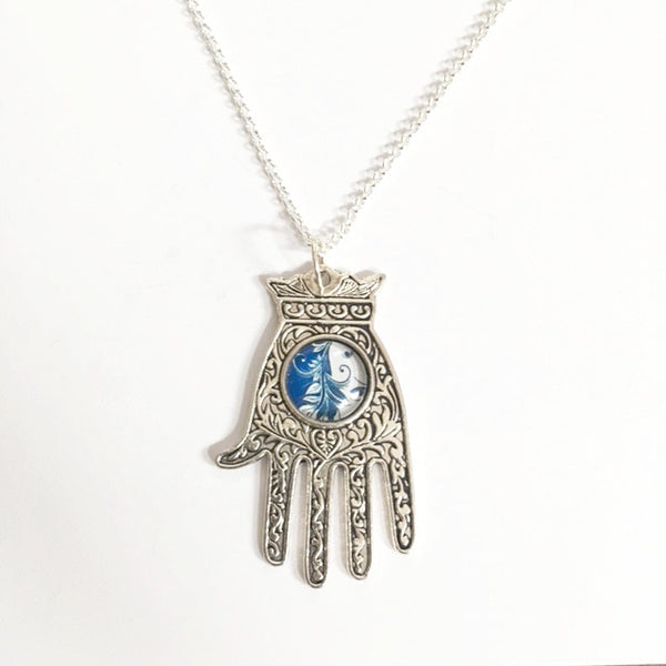 Necklace/hand shaped pendant with blue setting /hand therapy jewelry