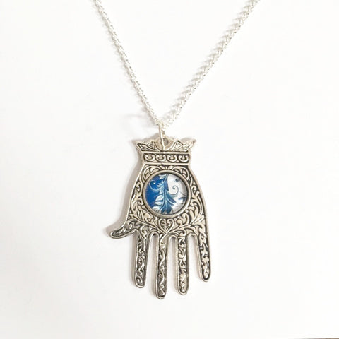 Necklace/hand shaped pendant with blue setting /hand therapy jewelry