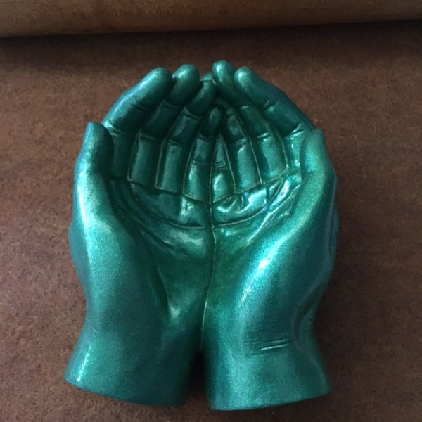 Token Hands/Cupped ceramic hands with token and mat
