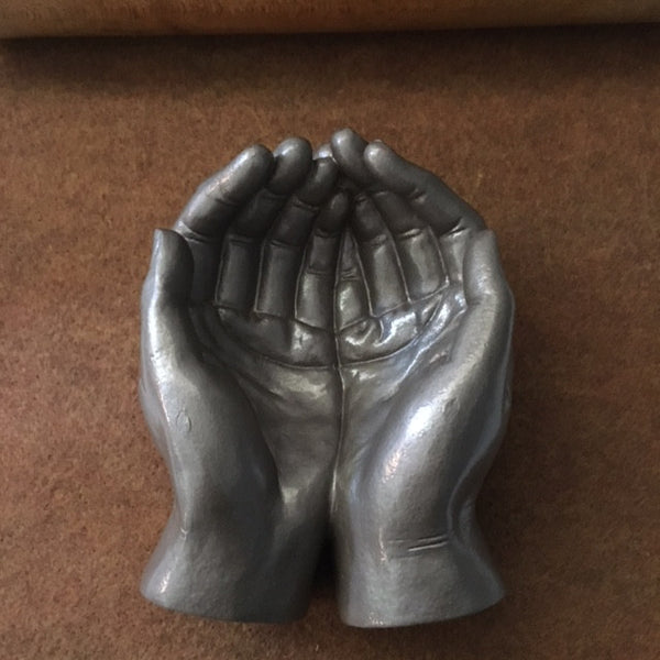 Token Hands/Cupped ceramic hands with token and mat