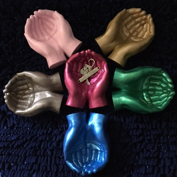 Token Hands/Cupped ceramic hands with token and mat