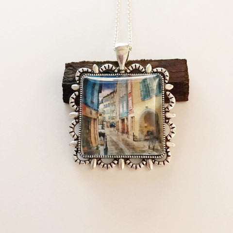 paintings on a pendant/city scene
