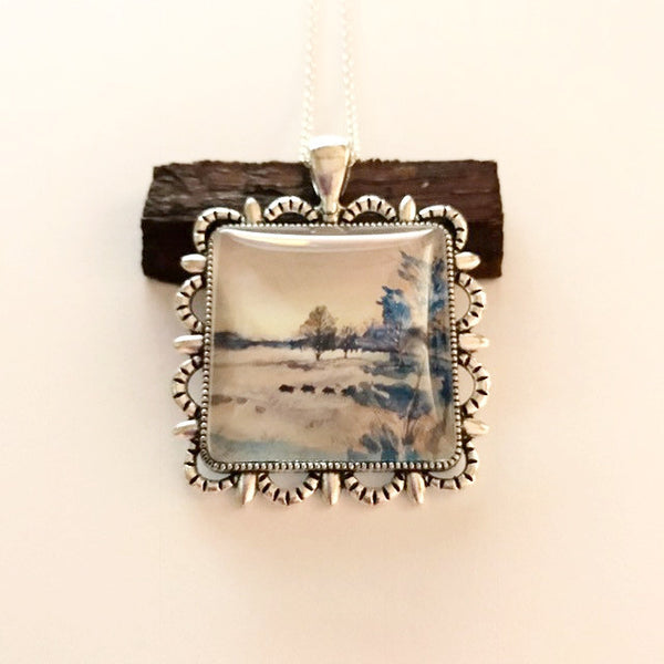 Water color painting on a pendant/Bison in the grass