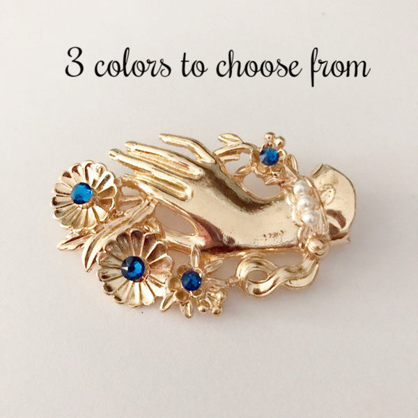 Vintage hand brooch with gem bouquet