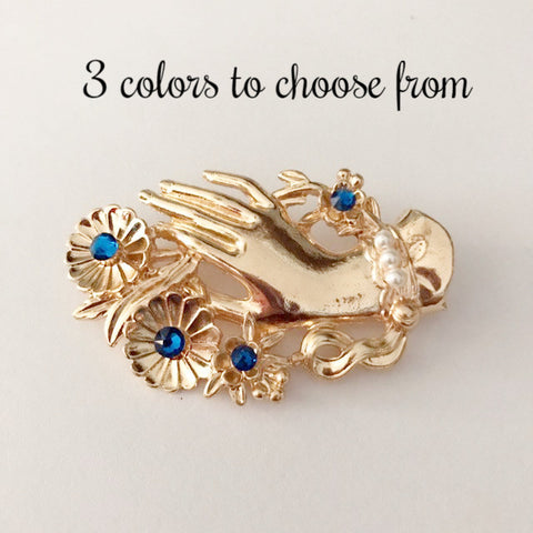 Vintage hand brooch with gem bouquet