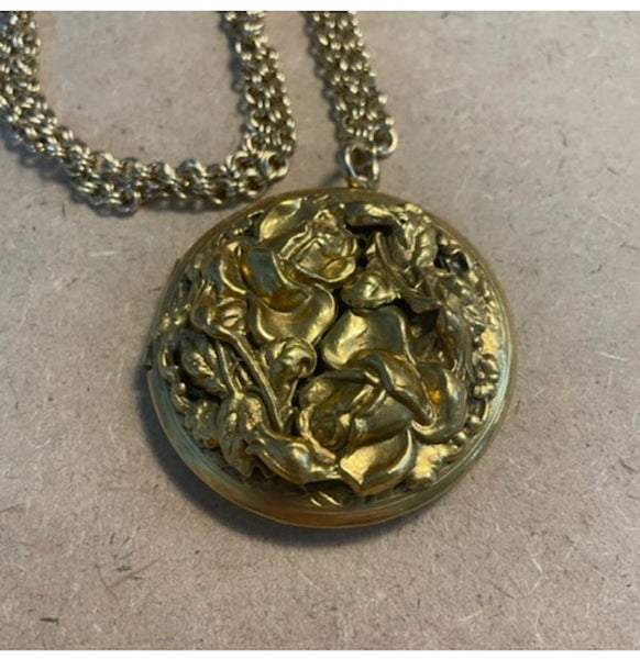 Gold dimensional brooch locket on chain