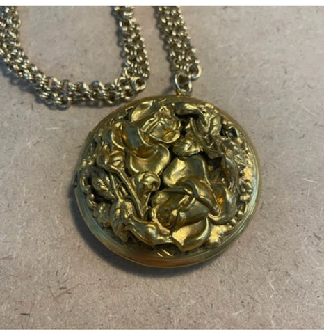 Gold dimensional brooch locket on chain