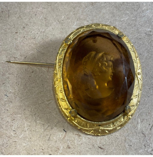 Oval Cameo with amber etched profile