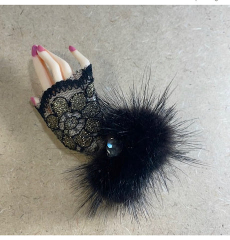 Hand shaped brooch with lace, fur and painted nails!