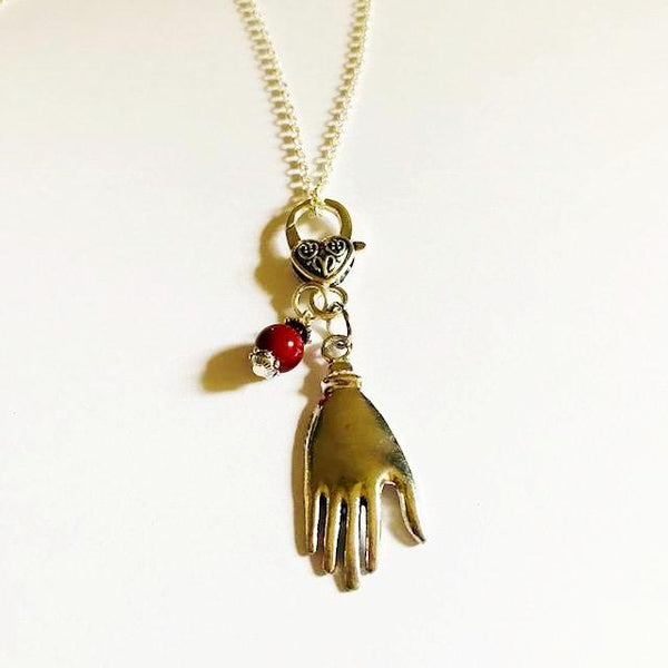 Hand shaped necklace with bead
