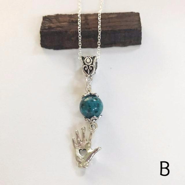 Bead necklace with charming hand/hand therapy jewelry