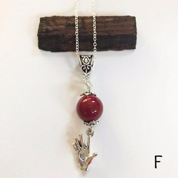 Bead necklace with charming hand/hand therapy jewelry