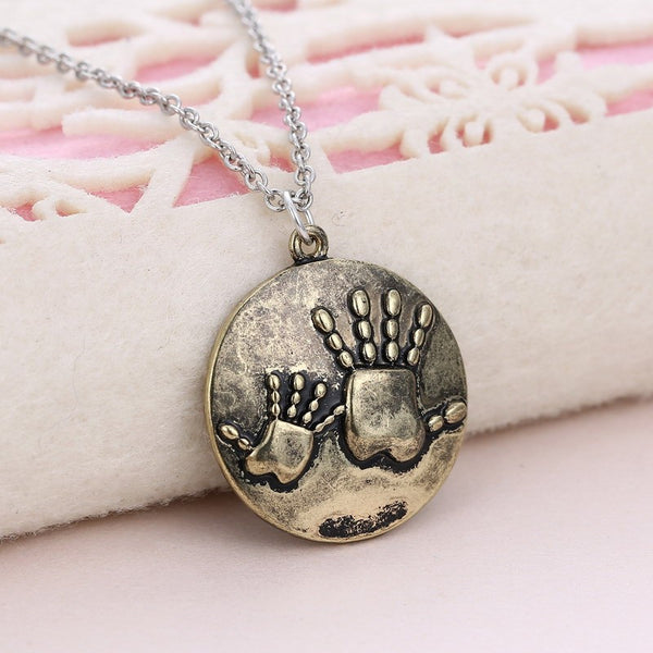 necklace mother and child hands