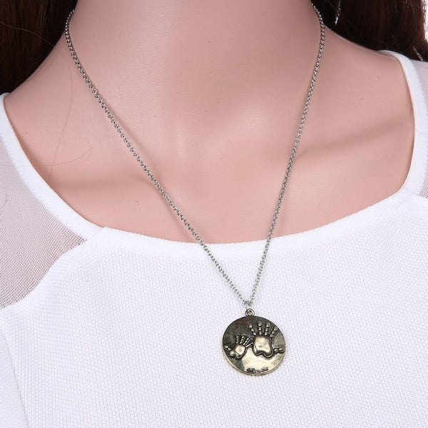 necklace mother and child hands