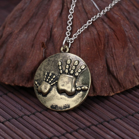 necklace mother and child hands